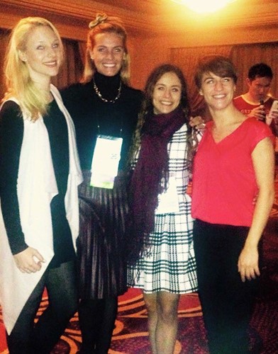 Four students at the 25th annual meeting